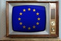 Old tube vintage TV with EU national flag on screen, television eternal values Ã¢â¬â¹Ã¢â¬â¹concept, global world trade, politics, retro